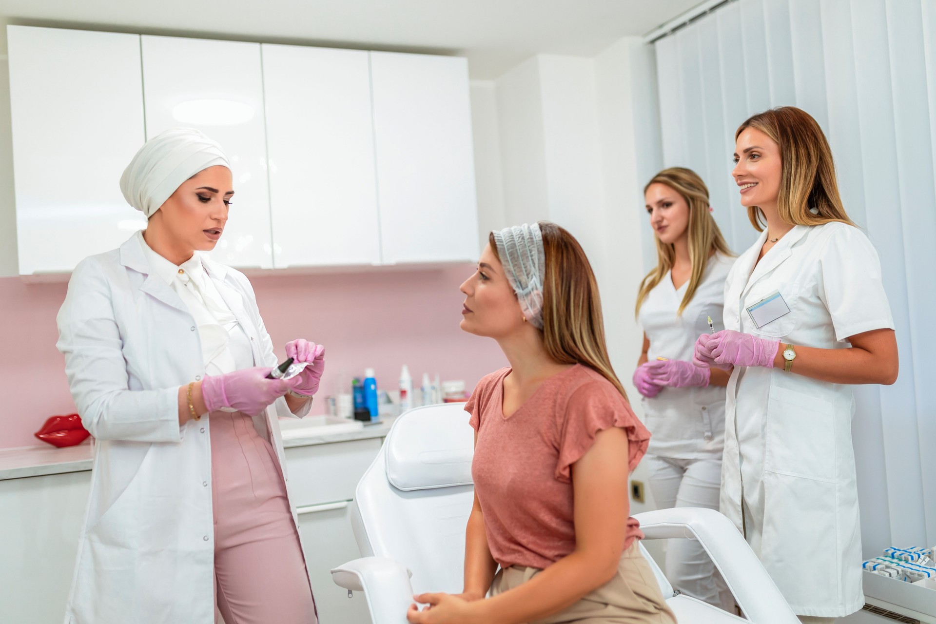 Beautiful young woman having multiple facial procedures